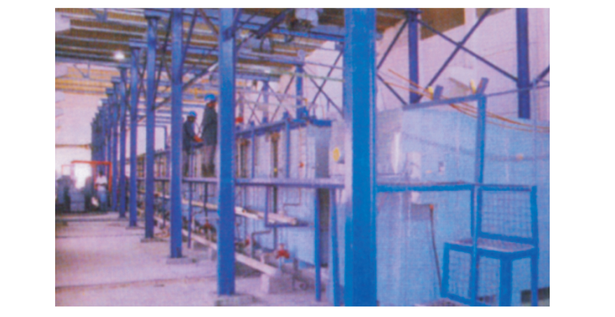 Laboratory facilities at Mekins Industries showing technician conducting quality testing and chemical analysis