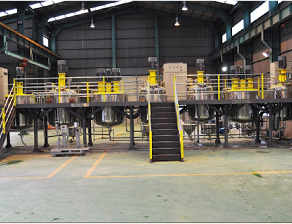 Industrial platform and heavy steel structure with stairs and safety railing used in manufacturing and cement plant applications